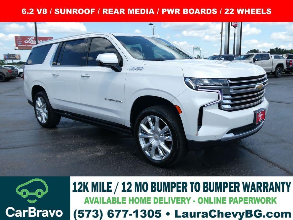 2021 Chevrolet Suburban High Country in Iridescent Pearl Tricoat — front three-quarter view