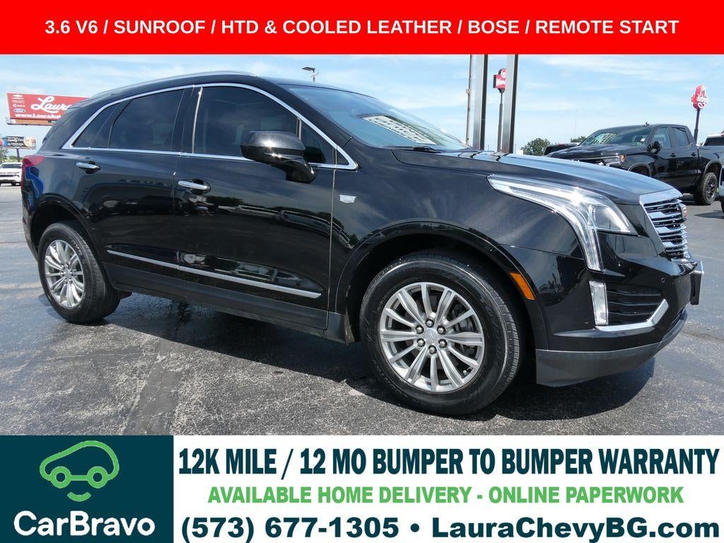 2019 Cadillac XT5 Luxury FWD in Stellar Black Metallic — front three-quarter view