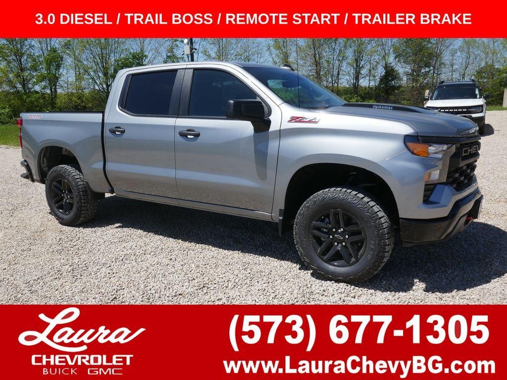 2026 Chevrolet Silverado 1500 Custom Trail Boss in Sterling Gray Metallic — front three-quarter view