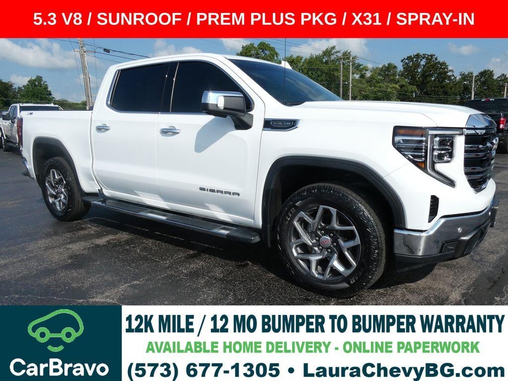 2023 GMC Sierra 1500 SLT in Summit White — front three-quarter view