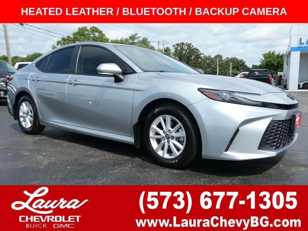 2025 Toyota Camry LE in Silver — front three-quarter view